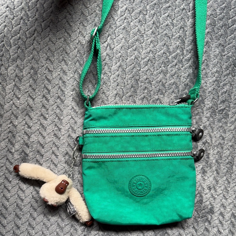 Kipling women’s‎ green 8”x7” zip front pockets bag with monkey Louise